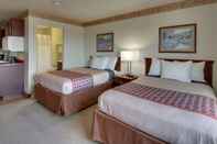 Bedroom All Towne Suites