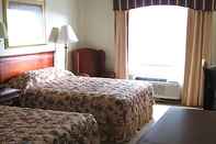 Bedroom Econo Lodge Inn and Suites
