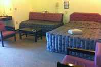 ห้องนอน Alcala Motel