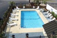 Swimming Pool Travelers Inn & Suites