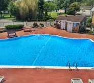 Swimming Pool 4 Budget Host East End Hotel in Riverhead