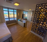 Bedroom 3 Magna Praia Hotel