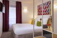 Bedroom Hotel Paris Louis Blanc