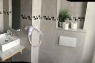 Phòng tắm bên trong Citotel Hotel De Berne
