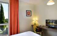 Bedroom 7 Logis Hotel Luccotel