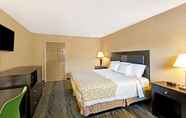 Bedroom 3 Days Inn by Wyndham Cherokee Near Casino