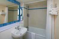 Phòng tắm bên trong Kyriad Direct Nancy Sud - Vandoeuvre