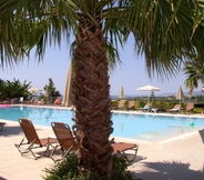 Swimming Pool 3 Astra Village Hotel Suites