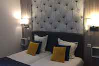 Kamar Tidur Hotel Residence City Loft