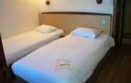 Bedroom 5 Kyriad Tarbes - Bastillac