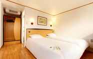 Bedroom 7 Kyriad Tarbes - Bastillac