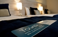 Kamar Tidur 5 Tower Inn and Suites