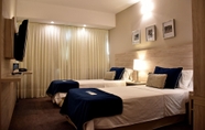 Kamar Tidur 3 Tower Inn and Suites