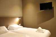 Bedroom Aston City Hotel