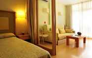 Bedroom 7 Evenia Olympic Suites