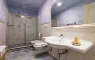 Phòng tắm bên trong 7 Hotel Borgo di Cortefreda Relais