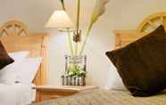 Kamar Tidur 4 Green Garden Resort & Suites