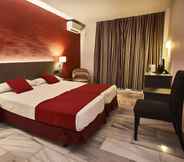 Kamar Tidur 4 Nerja Club by Dorobe Hotels