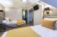 Kamar Tidur Pratic Hotel