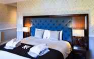 Kamar Tidur 4 Fisher's Hotel