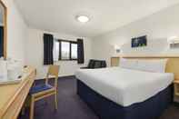 ห้องนอน Days Inn by Wyndham Bridgend Cardiff M4