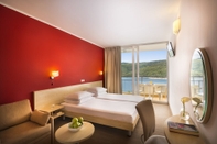 Bedroom Allegro Sunny Hotel & Residence by Valamar