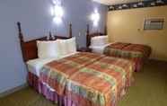 Bedroom 7 Coronada Inn and Suites