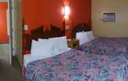 Bedroom 6 Coronada Inn and Suites