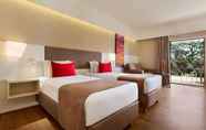 Bedroom 5 Ramada Plaza by Wyndham Thraki