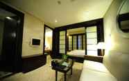 Kamar Tidur 5 Green Garden Hotel