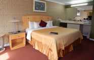 Bedroom 6 Admiralty Inn & Suites