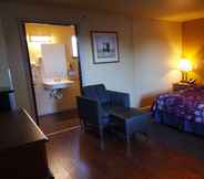 Bilik Tidur 7 Americas Inn and Suite