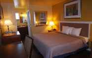 Bedroom 5 Americas Inn and Suite