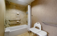 In-room Bathroom 5 Cumberland House Knoxville, Tapestry Collection by Hilton