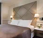 Kamar Tidur 4 Hotel Longchamp Elysees