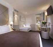 Kamar Tidur 6 Hotel Longchamp Elysees