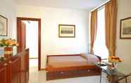 Kamar Tidur 7 Vatican Suites Hotel & Residence