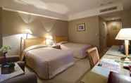 Kamar Tidur 2 Chuto Plaza Hotel