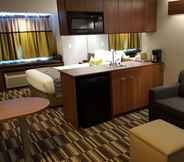 Bedroom 2 Microtel Inn & Suites by Wyndham Bellevue/Omaha