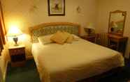 Kamar Tidur 4 Castletown Hotel