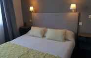 Bedroom 6 Brit Hotel Acacias