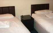 Kamar Tidur 4 Forest Gate Hotel