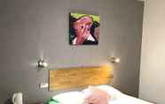 Kamar Tidur 6 Street Art Hotel