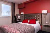 ห้องนอน Brit Hotel Confort Foix