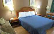 Phòng ngủ 6 Royal Inn & Suite