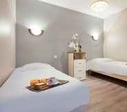 Bedroom 7 Appart'City Classic Caen