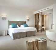 Bedroom 2 Gabbiano Azzurro Hotel & Suites