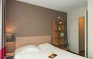 Bedroom 7 Appart'City Classic Nantes Viarme