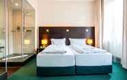 ห้องนอน 5 Flemings Hotel München-City