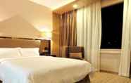 Bilik Tidur 4 Guangzhou Easun Guotai Hotel